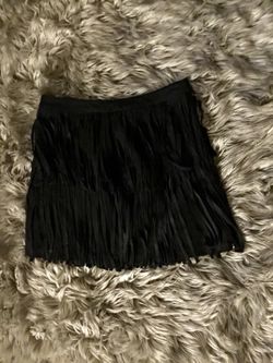 Black small skirt.