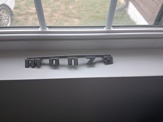 1979 Chevy Monza Front Facia Bumper Emblem 