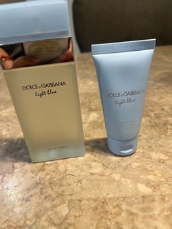 Perfume nuevo y crema, el perfume, el grande sin usar buen precio