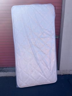 Twin Mattress in Plastic