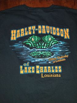 Harley-Davidson t-shirt from Lake Charles, Louisiana, featuring a colorful graphic of an alligator emerging from the water on the back Men's XL $20.00