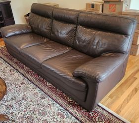 Brown genuine leather Natuzzi Editions couch