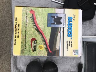 Drain hose support for RV