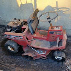 vintage sit on lawnmower