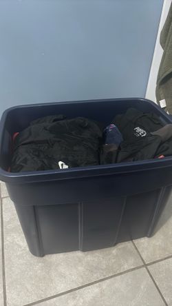 Bin full of clothes