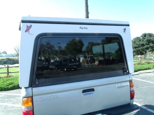 GENTLY USED FLIP PAC CAMPER SHELL