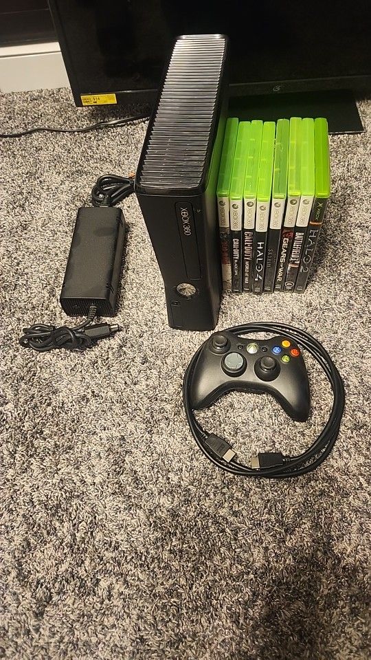Xbox 360 Slim With 8 Games 