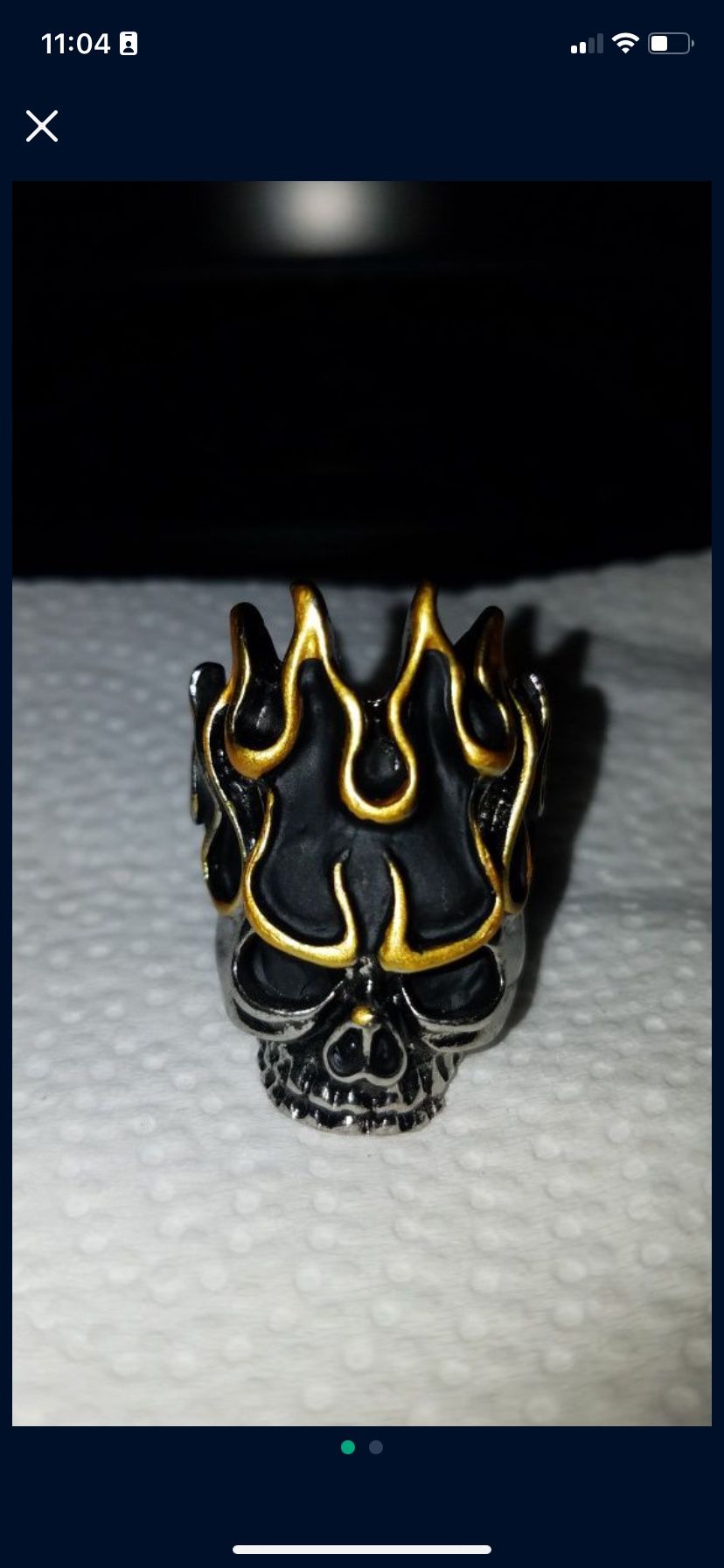 Size 9 solid Stainless steel with 18kt. GP on the flames. Flaming Skull ring.