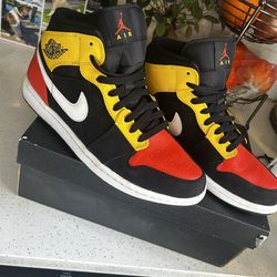 Jordan 1 Mid Black Amarillo Orange
