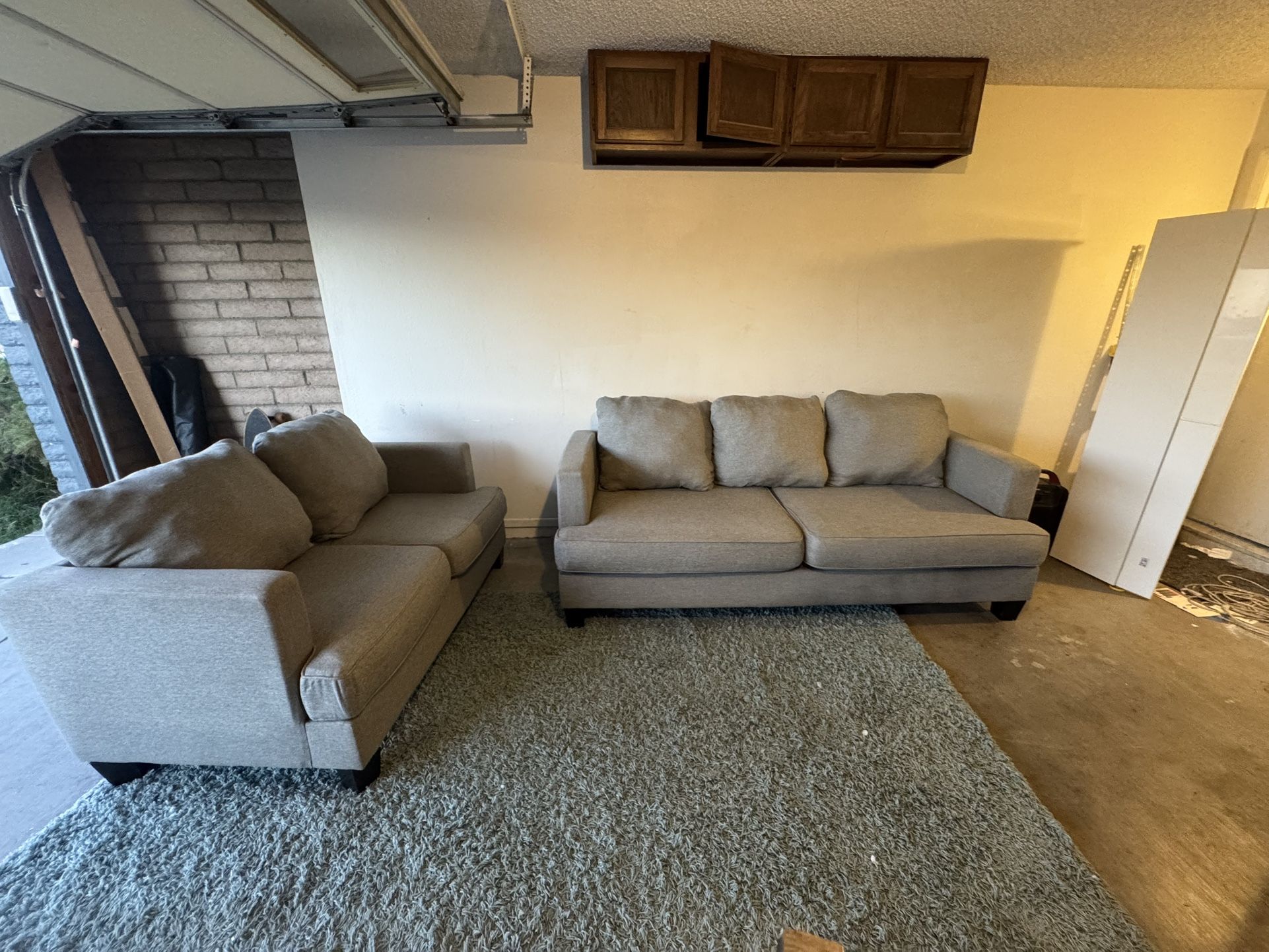 Living Spaces Gray Twin Set Sofa Loveseat