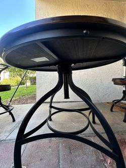 Bar table adjustable with stools