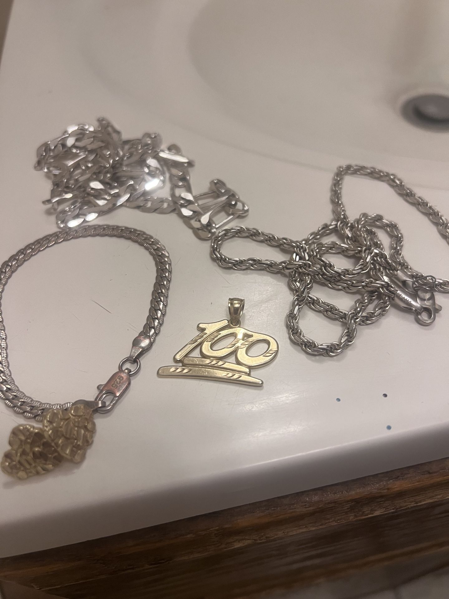 Gold And Silver Chain Bracelet Earrings Pendant Etc