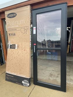 New Storm door  platinum  black slide size w32 h80 or 81 left hand Outswing $275
