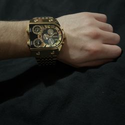 Black And Gold Chronograph Watch 