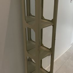 Vintage distressed, shabby chic display cabinet curio knickknacks. In Jupiter.