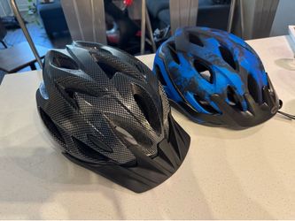 Two bike helmets
