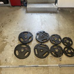 Olympic Weight Set- Bar/clips, 45s,35s,25s,10s. 