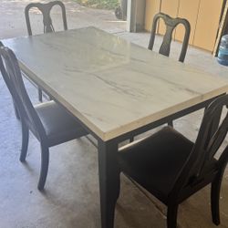 faux marble dining table with 4 chairs