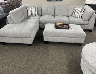 West Elm Gray chenille sectional couch and ottoman