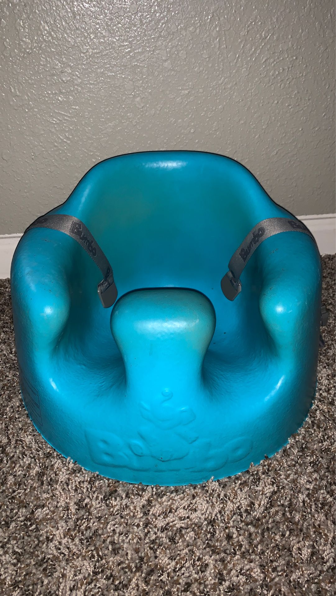 Bumbo chair with straps