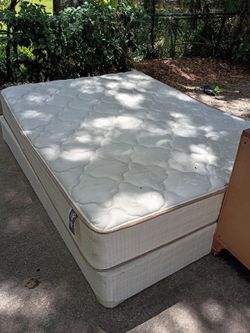 Full size mattress and box spring with dresser style nightstand