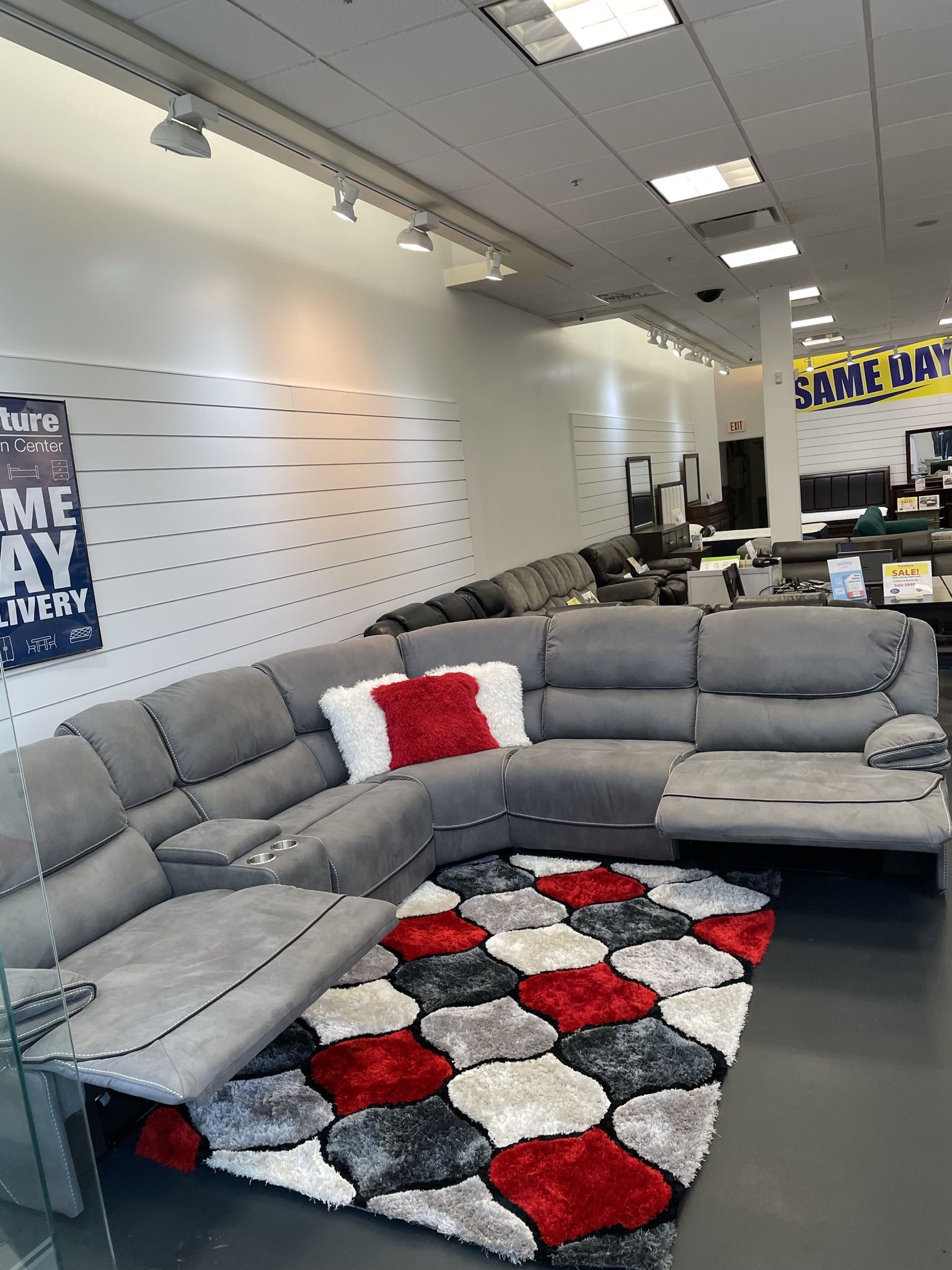 Going out of business sale. Alejandro Gray reclining sectional now $1599. Easy finance option. Same day delivery.