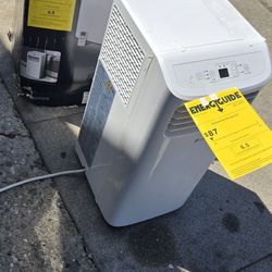 LG 6,000 (DOE) BTU 115-Volt Portable Air Conditioner Cools 250 Sq. Ft. with Dehumidifier and LCD Remote