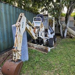 Burkeen Tractor/ backhoe / ditchwitch