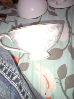 Vintage Porcelain Teacup with Gold Trim