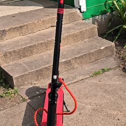 It's Red And Black The Electric Scooter