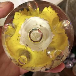 Vintage clear glass paperweight with Yellow flower inside 