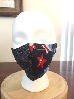 Handmade mask 100% cotton. has adjustable buckle for ears and strip nose bridge wire. Comes in addition a compartiment for filter.