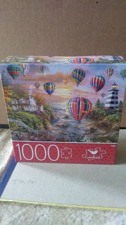 Cardinal 1000 piece puzzle "Balloons Over Cottage Cove"