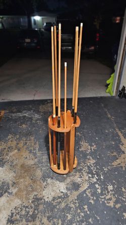 Pool stick holder + sticks