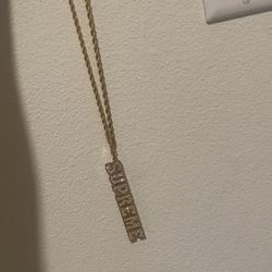 Gold supreme key Chain