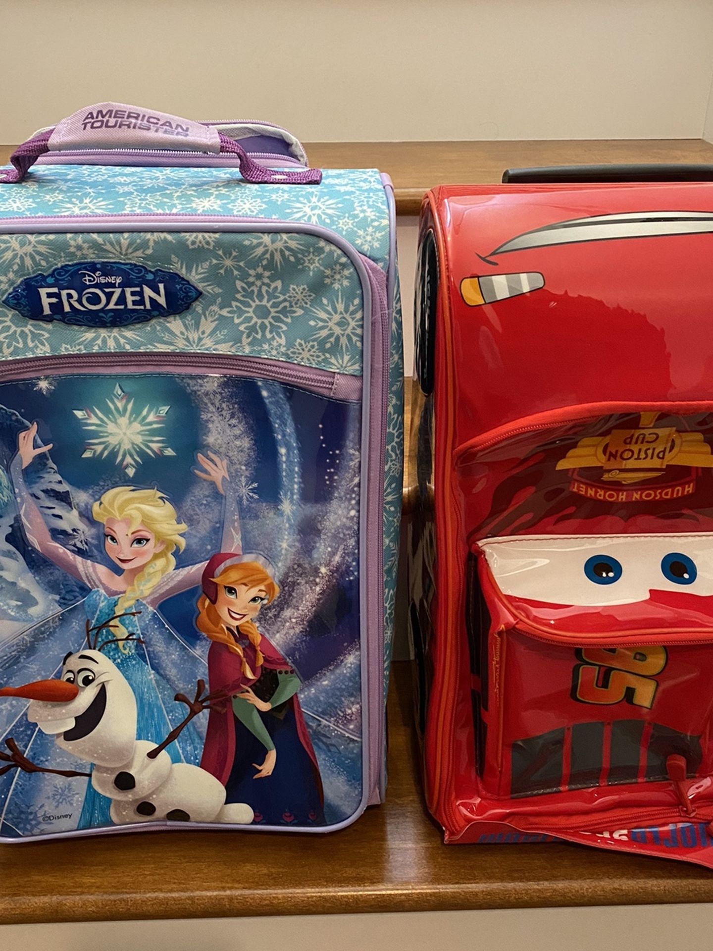 Frozen And cars Kids Suitcases. Barely Used Like New.