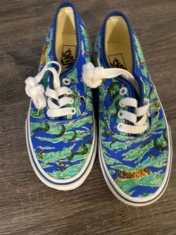 Vans Kids Authentic sneakers in the "Wild Camo Blue Multi" colorway.