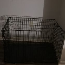 Large folding steel dog cage and supplies