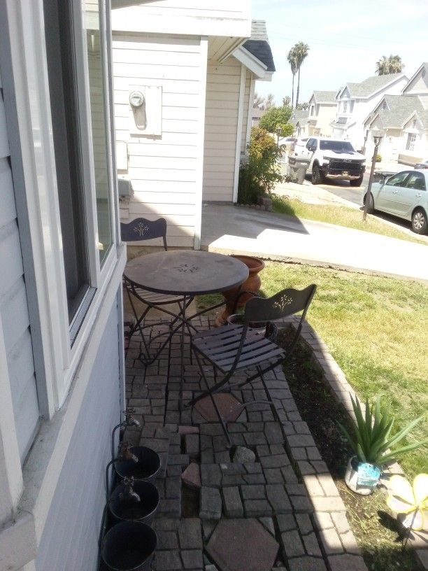 Wrought Iron Antique Table And Chairs