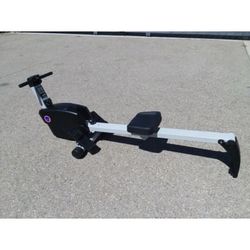 Rowing machine with adjustable tension for resistance and folding up feature for space saver “new”