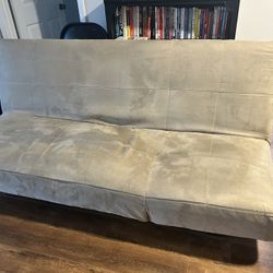 Fluffy Beige Futon Couch Perfect For Extra Sleeping Space