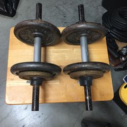 50 Lbs of Weider Weights /Weider 4 - 10lb & 4- 2 1/2 lb Olympic Weight Plates 50 lb Total Plus 2 Bars