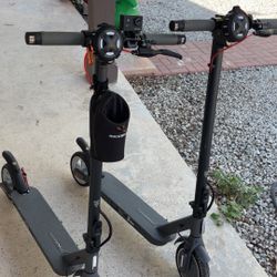 2 Scooters With Extras 