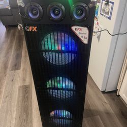  QFX  it has 3  speakers  with microphone and remote control it has   Bluetooth  USB FM radio and SD it has LED party Lights Sounds Great