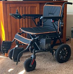 POWER WHEELCHAIR.  NEW!!