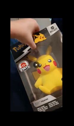 Deluxe Pikachu vinal plus deck of cards