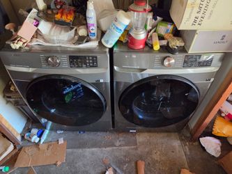 Washer and gas dryer. Samsung front loaded.  Black