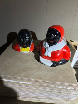Aunt Jemima and Uncle Moses cookie jar lids