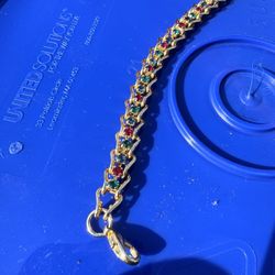 Gold Bracelet Wit Emeralds, Ruby. 