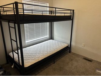 Bunk bed with mattresses